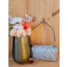 Sac forme cylindrique avec des sequins à fermeture éclair