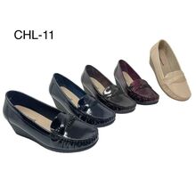 Mocassins vernis  à talon compensé avec détail de mors texturés et croisés taille 36 à 41