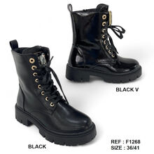 Bottines rangers sur semelle crantée avec boucle à grand strass et oeillets dorés