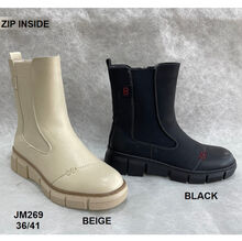 Bottes à semelle crantée avec  zip côté intérieur et élastique latéral