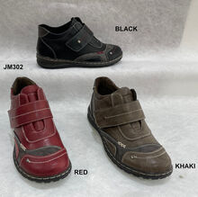 Bottines à surpiqûres visibles et une bande auto-agrippante