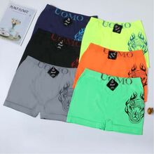 Boxer homme en polyamide à motif de serpent stylisé sur la cuisse