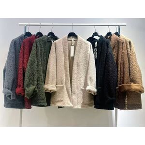 Veste douce et texturée classique avec deux poches plaquées