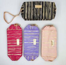 Trousse de maquillage avec des rayures métalliques "Beautiful Girl"