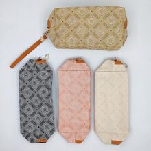 Trousse de maquillage motif élégant style monogramme