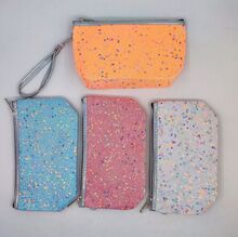 Trousse de maquillage avec sequins et paillettes de type confettis