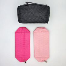 Trousse de maquillage zippé au design tressé sur l'ensemble