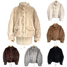 Veste en fausse fourrure au toucher très doux avec poches décoratives