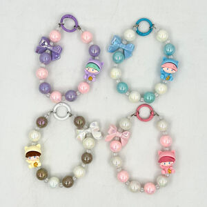 Dragonne de téléphone en perles avec nœud et breloque de style kawaii