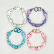 Dragonne de téléphone en perles avec breloques étoile et cornet de glace