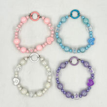 Dragonne de téléphone en perles avec cœur smiley et perles cubiques