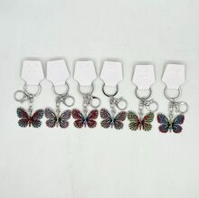 Porte-clés papillon scintillant ailes multicolorées en métal argenté