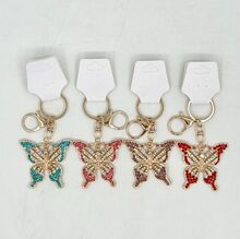 Porte-clés en métal doré papillon "Diamant" ailes cristallisées