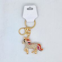 Porte-clés licorne magique scintillante et colorée en métal doré