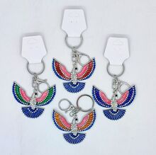 Porte-clés à pendentif oiseau en métal argent émaillé et orné de strass