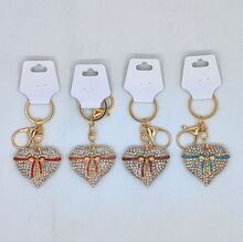 Porte-clés cœur en métal en strass et ruban nœud papillon doré