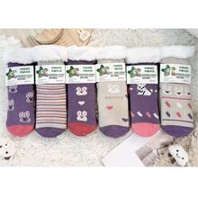 Chaussettes d'intérieur chaudes et antidérapantes avec de beaux lapins