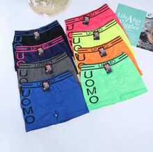 Boxer pour homme ornée du logo "UOMO" en lettres majuscules