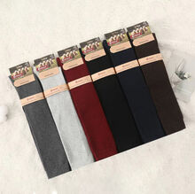 Chaussettes unie confortables et hautes en laine pour femme