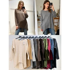 Pull coupe asymétrique plus court à l'avant et plus long à l'arrière