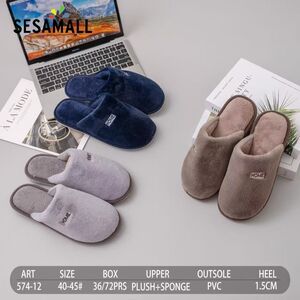 Mules d’intérieur homme en peluche et éponge avec étiquette “HOME”