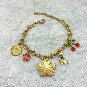 Bracelet en acier inoxydable doré à motif motifs floraux, western et cerise rouge