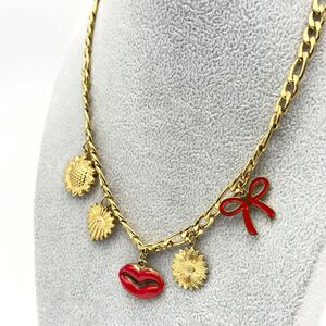 Collier breloques tendance acier inoxydable Soleil, Lèvres & Nœud rouge